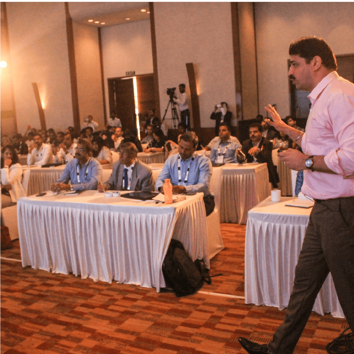 Amit Jadhav answering questions from the audience at a seminar